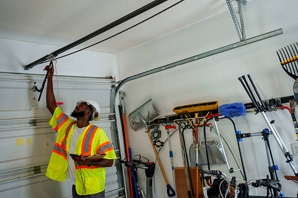 Professional Garage Door Panel Replacement technician working in Webster Parish County, LA